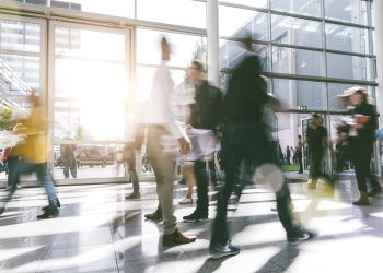 blur of potential customers walking in a building