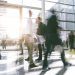 blur of potential customers walking in a building