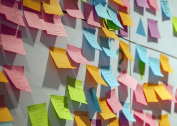 colourful post it notes on a board for preparing marketing plan
